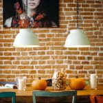 Shelves - rectangular brown wooden table with two pumpkin on top