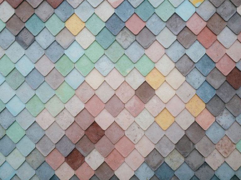Materials - a multicolored tile wall with a pattern of small squares