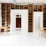 Shelves - two beige wooden tables in white room