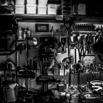 Garage Shelves - grayscale photography of metal tools